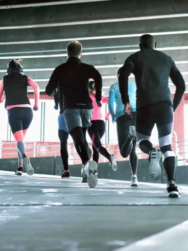 Athletes running together 